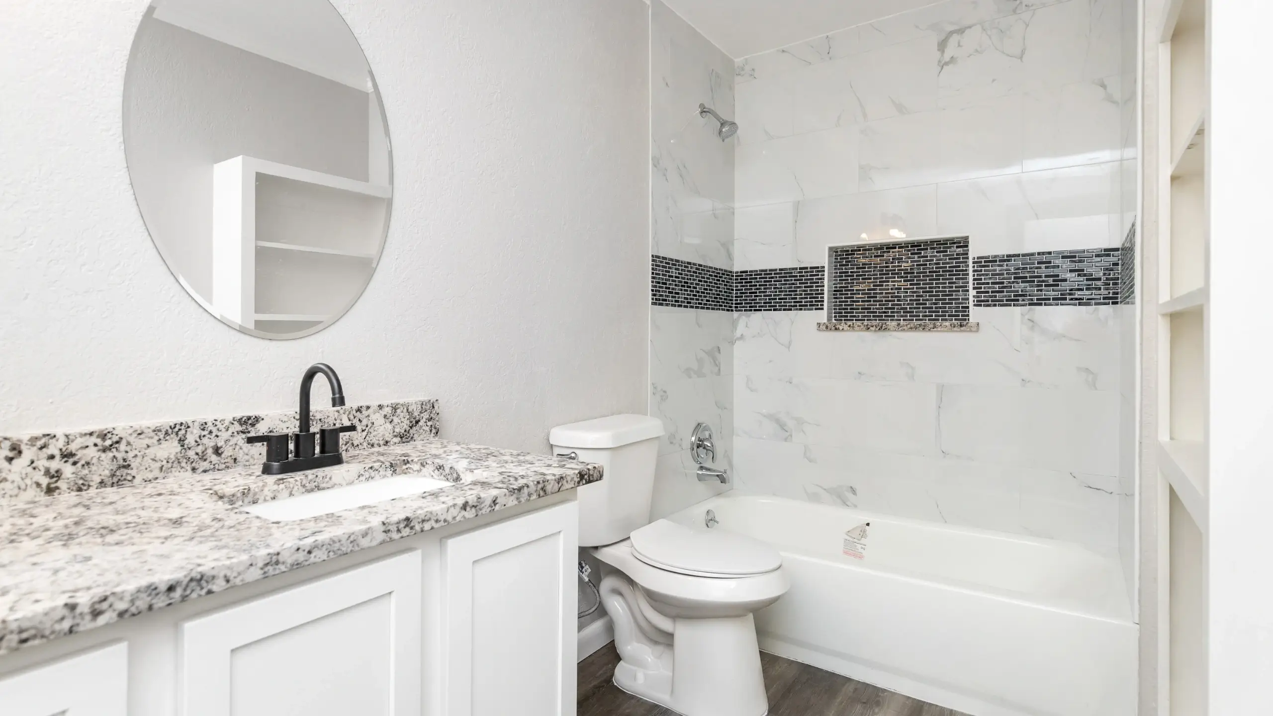 Anaville - hall bathroom full gut and remodel, new vanity, new granite counters, new toilet, new mirror, new faucet, new tiled shower, new tub