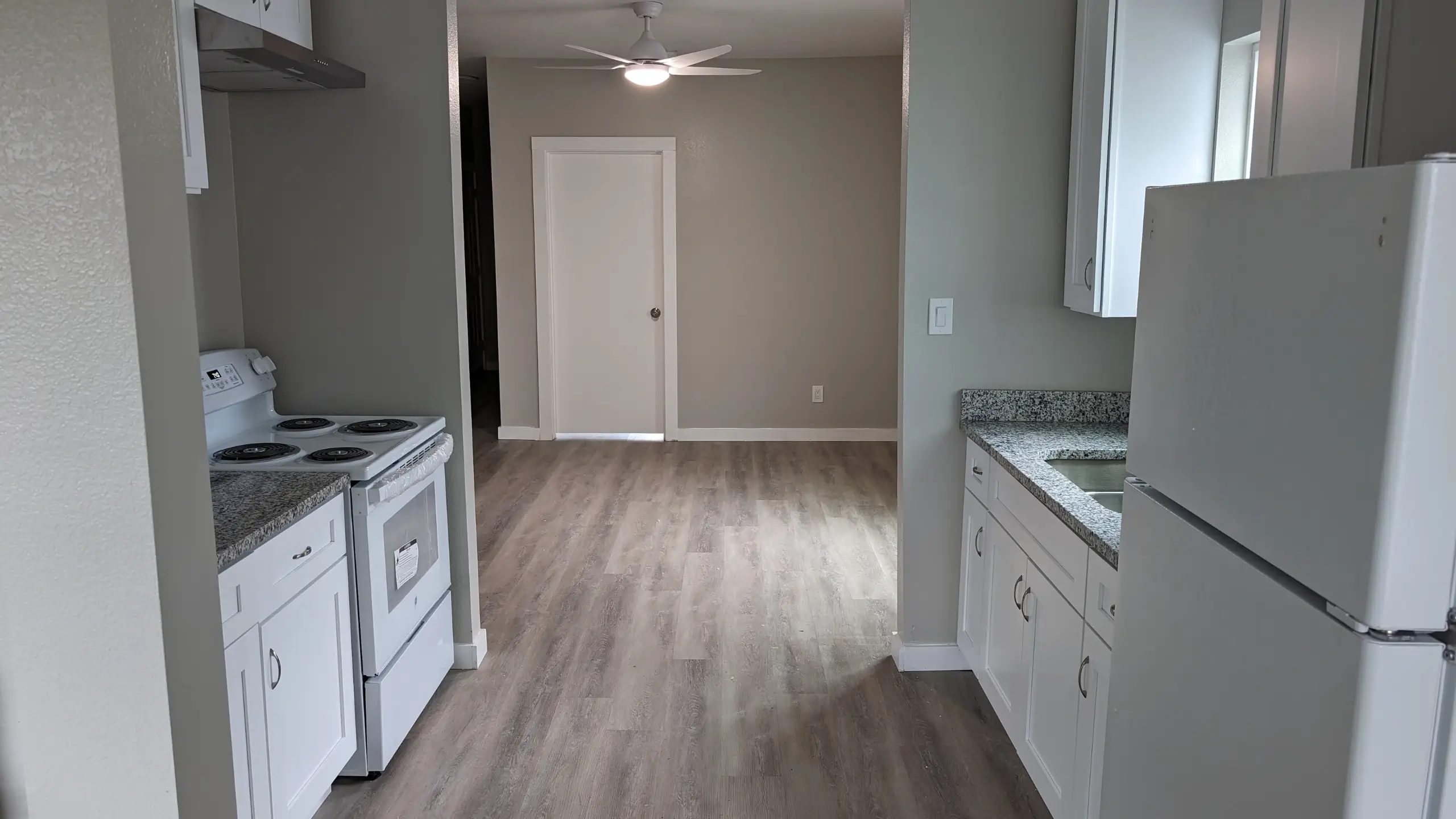 Bay View - after kitchen remodel in major renovation, new cabinets, new framing, new granite counters, new appliances