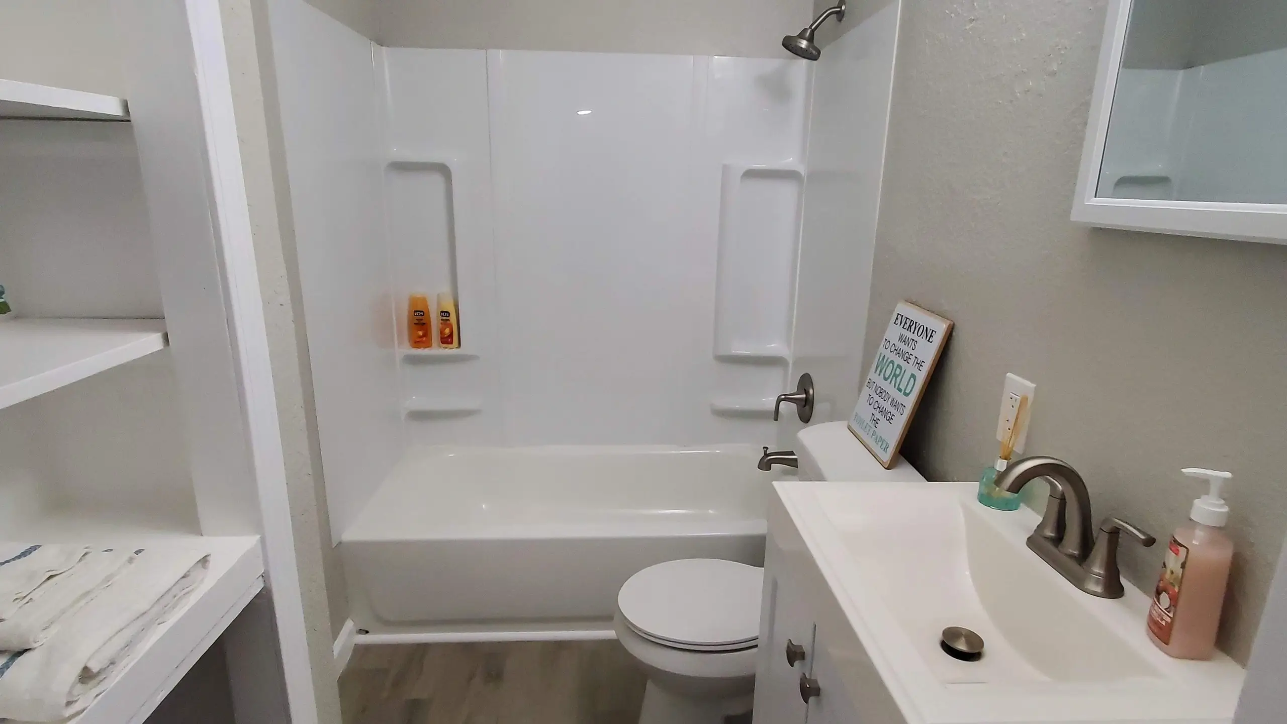 Moravian Village - simple bathroom remodel in a flip home